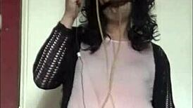This amateur crossdresser really takes a piss at home in a homemade video