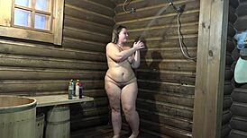 BBW with big butt sex video featuring an amateur rubs one out in the shower and displays her hairy twat