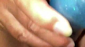 Mature big breasted woman plays with vibrator alone