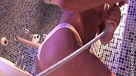 bodybuilder gets wet and naked in shower