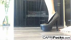 capri the brunette pornstar masturbates her pussy solo in high heels