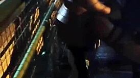 Two gay men embark on a wild outdoor fuck along the public road, their bodies entwined in raw passion.