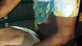 Two gay men embark on a wild outdoor fuck along the public road, their bodies entwined in raw passion.