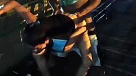 Two gay men embark on a wild outdoor fuck along the public road, their bodies entwined in raw passion.