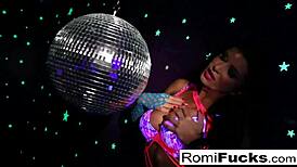romi rain explores a disco ball and toys in a night club solo session