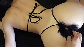 The brunette cosplay girl rides a big black cock in her fitness outfit