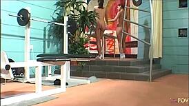 Petite brunette feels passion with gym partner using toys