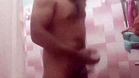 a woman reaches orgasm through masturbation in the oaxaca shower