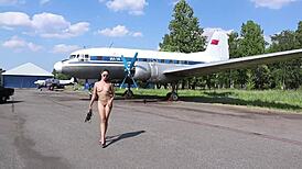 Wow, check that NUDE MODEL with Soviet plane and Black Volga!