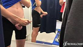 in the hot fitting room, a sporty twink gives an intense handjob leading to a cumshot
