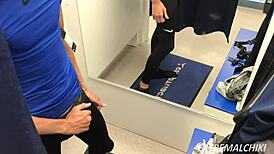 in the hot fitting room, a sporty twink gives an intense handjob leading to a cumshot