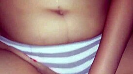 Latina amateur touches her shaved pussy