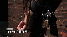 Tall tattooed beauty in device