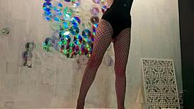 Beautiful model masturbates to wild orgasm after Christmas photoshoot session