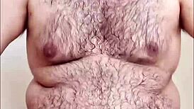 Curious gay chubby man reveals hairy body