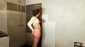 I recorded this mature brunette cleaning in skimpy clothes at home