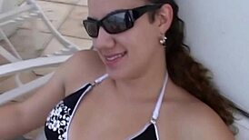 Amateur Young Woman Models Bikini at Beach Event