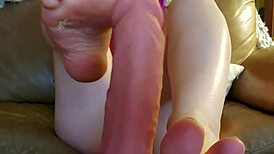 Mistress teases foot slave with rewards