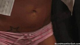 Submissive slave licks mistress's pussy to orgasm in bondage