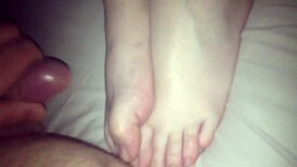 amateurs give footjobs in casual settings