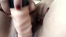 pornstar poosoo plays with dildo