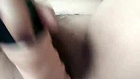 pornstar poosoo plays with dildo