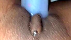 I'm stuffing my pierced pussy with this pretty dildo, feeling every homemade inch