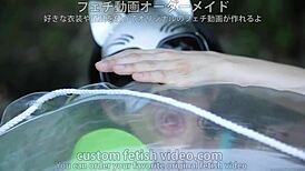 A Woman Inflates A Float In Fetish Close-Up Detail