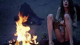 In this fantasy, baremaidens gather around the campfire