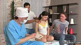 Physician observes hymen exam while virgin teen gets penetrated in intense group session. The cute hairless girl faces hardcore defloration.