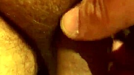 Guy jerks his soft cock in the bathroom