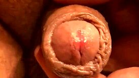 Guy jerks his soft cock in the bathroom