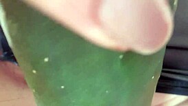 suggestive mature woman spreads legs for cucumber masturbation massage