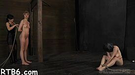 These sexy slaves strip down in a tiny cage, so hot! 😍