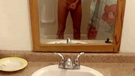 Girl plays innocently in the bath, bathing and showering without any adult themes.