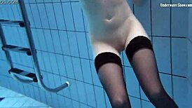 Swimming pool teen Anetta undresses for fun