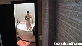 hey, my ex gf is showering in the tub, showing her shaved tits 😏