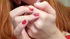 redhead lights up a cigarette and smokes