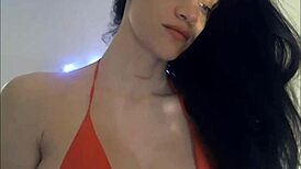 Young Eighteen-Year-Old Babe Teases with Her Large Breasts