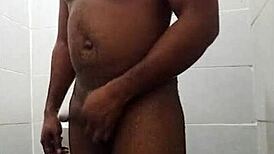 My boyfriend jerks off his big dick in bathroom