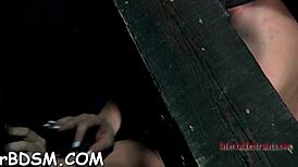 Brunette slave chick masturbates naked on cam