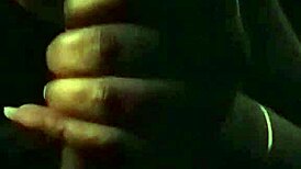 In the late night, an ebony milf delivers a sloppy blowjob to a big black cock.