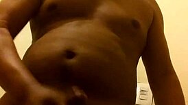 I masturbate passionately in the shower, stroking my body sensually