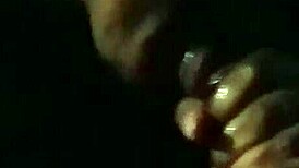 In the late night, an ebony milf delivers a sloppy blowjob to a big black cock.