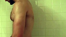 An ebony jock with muscular build engages in a passionate 69 with a white hunk, their interracial bodies intertwining in amateur gay porn