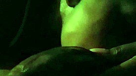 In the late night, an ebony milf delivers a sloppy blowjob to a big black cock.