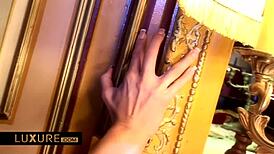 Vanessa Goldi explores the swinger castle with friends, enjoying group activities and intimate touches.