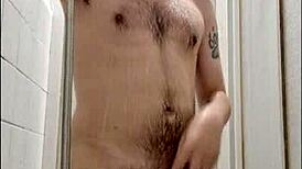Young Hairy Guy Relaxes In Shower