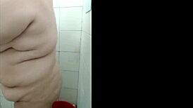 I'm home alone, bathing in the shower before playing with my dildo for intense pleasure.