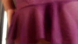 The transvestite models her outfit in the studio.